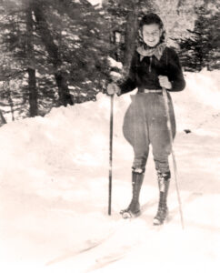 Vintage photo of woman in skis